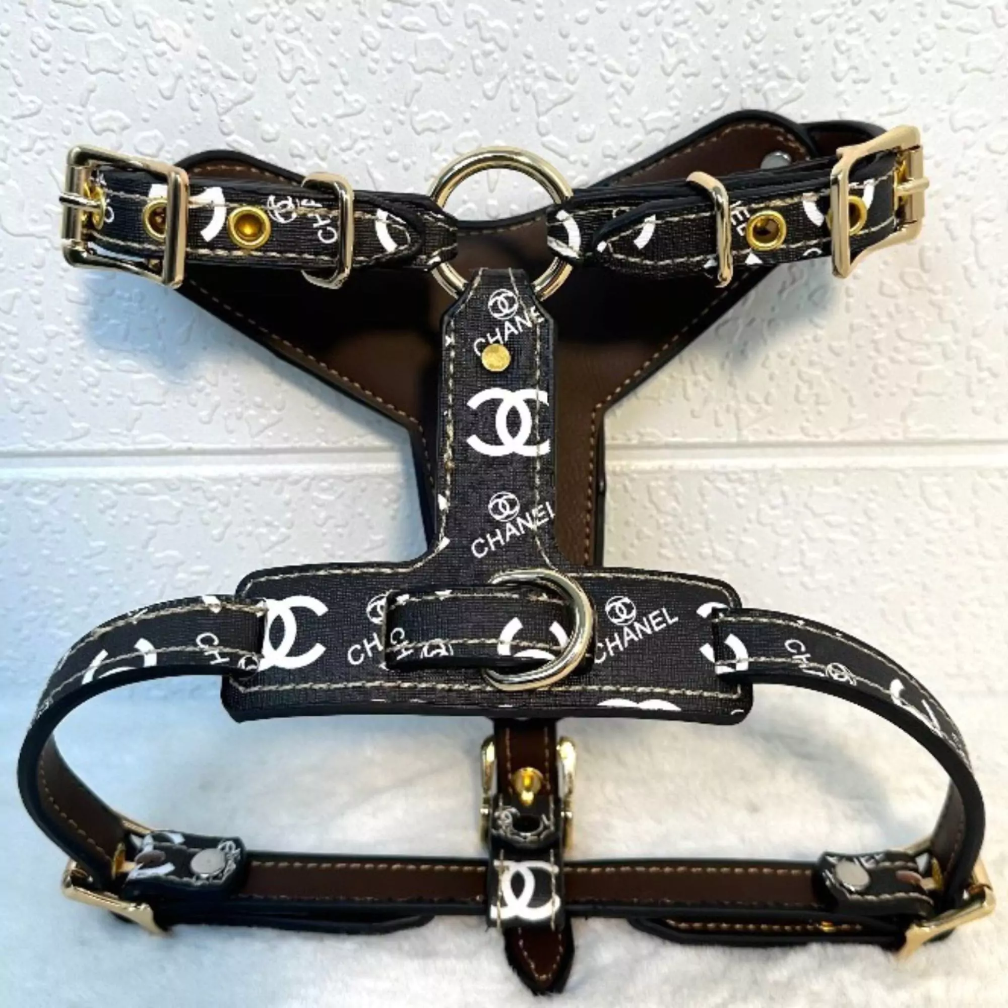 Opulent Elegance: Black Chanel Harness for Dogs with White Logo and Gold Hardware1